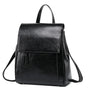 Sac à dos en cuir de vachette noir avec rabat, bandoulière ajustable et poche zippée