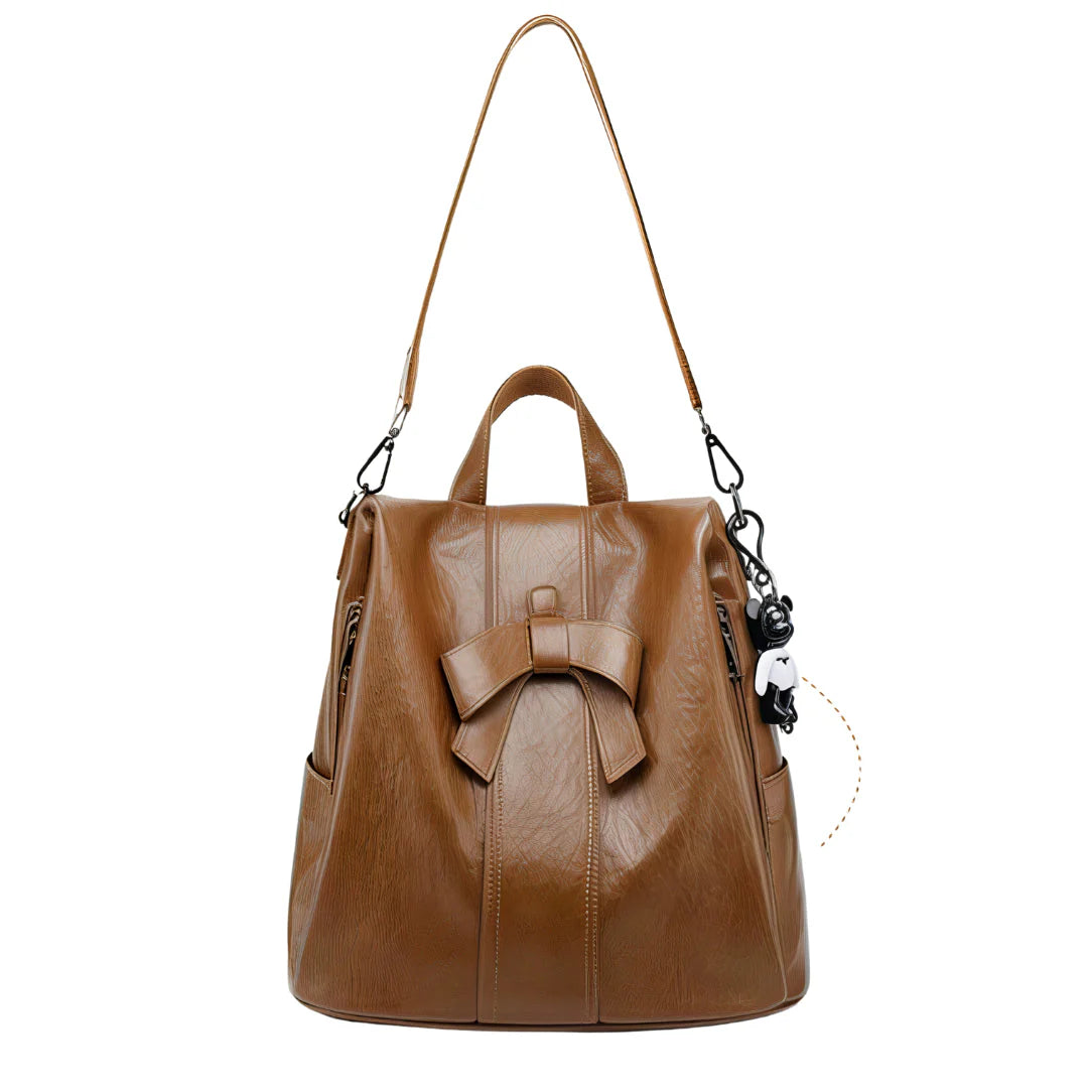 Sac à dos en cuir marron avec nœud papillon et sangle amovible