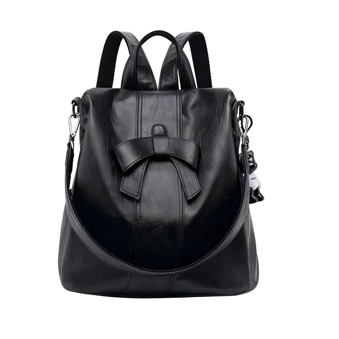 Sac à dos en cuir noir avec nœud papillon proéminent à lavant