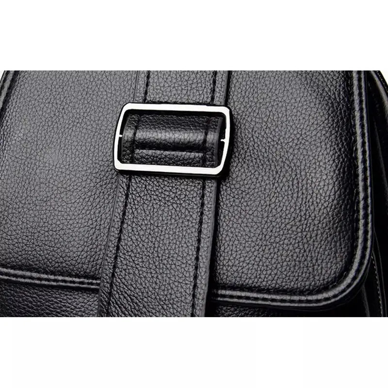 Sac à dos en cuir noir pour femme avec fermeture à boucle en argent