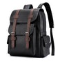 Sac à dos en cuir noir pour ordinateur avec accents en cuir marron et boucles