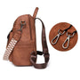 Sac à dos en cuir végétal brun avec bandoulière détachable et style élégant