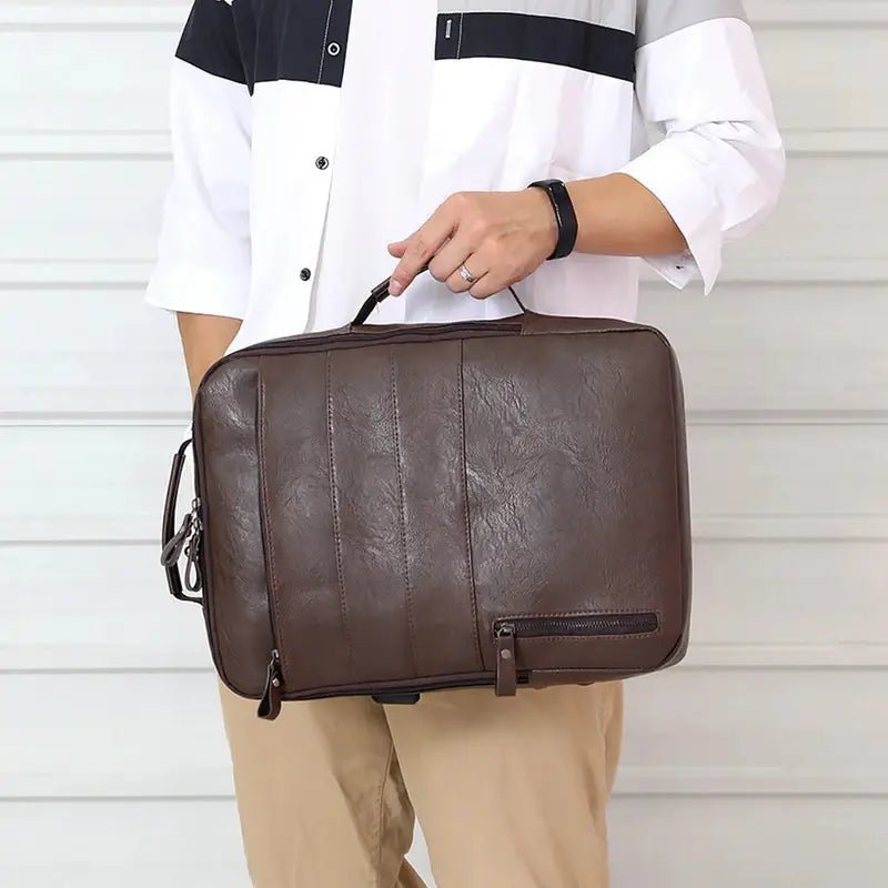 Sac à dos en simili cuir homme avec poignée, poche zippée et surface texturée