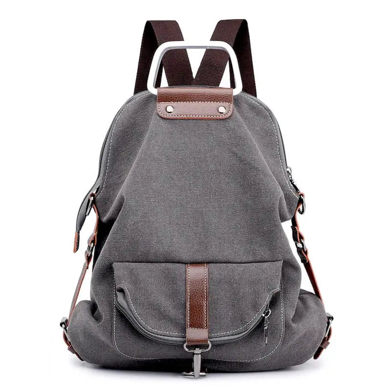 Sac à dos en tissu minimaliste gris avec accents en cuir marron et poche frontale
