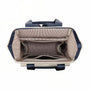 Sac à dos Epine en toile beige et bleu marine avec poignées et garniture noires