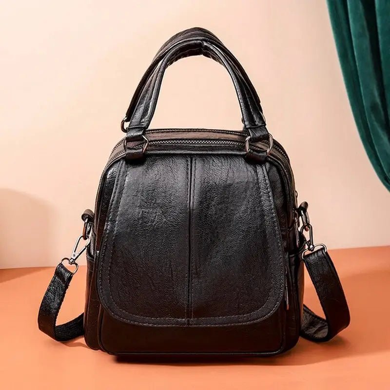 Sac à dos femme en cuir chic avec sacoche en faux cuir noir, poignées et bandoulière détachable