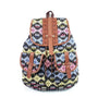 Sac à dos femme en toile imprimée avec motif géométrique coloré, accents en faux cuir brun