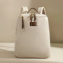 Sac à dos femme en cuir blanc avec accents marron, 14 pouces Transit