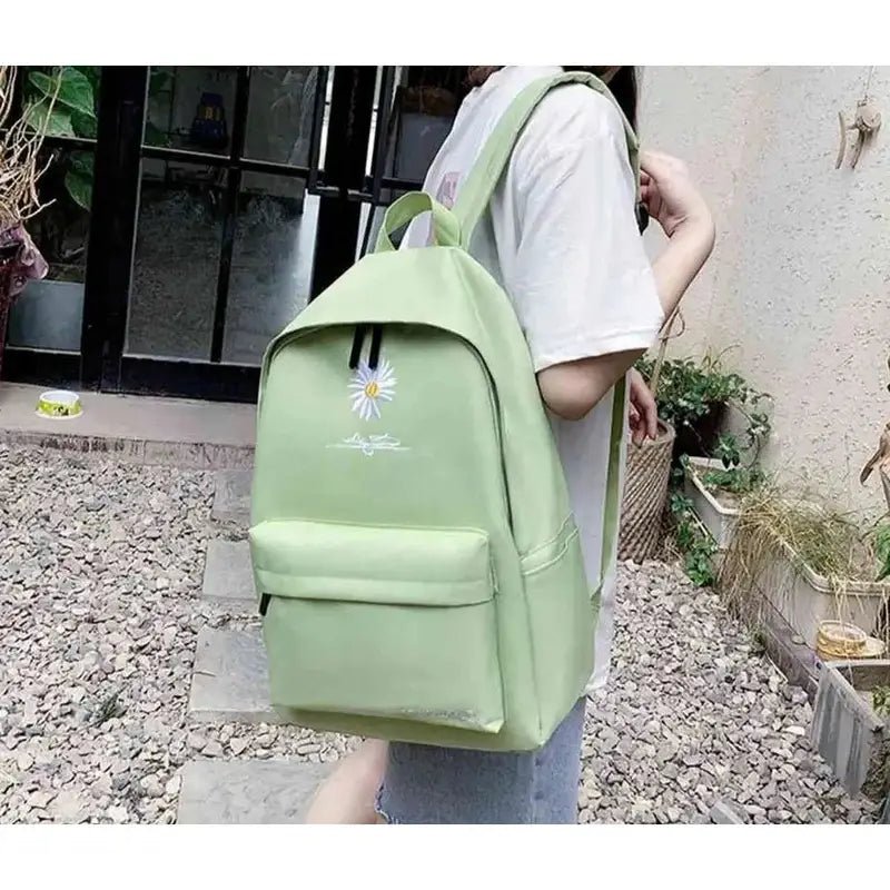 Sac à dos fille 10 ans vert clair avec design de marguerites