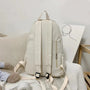 Sac à dos fille collège en tissu beige clair avec bretelles ajustables et poche zippée verticale