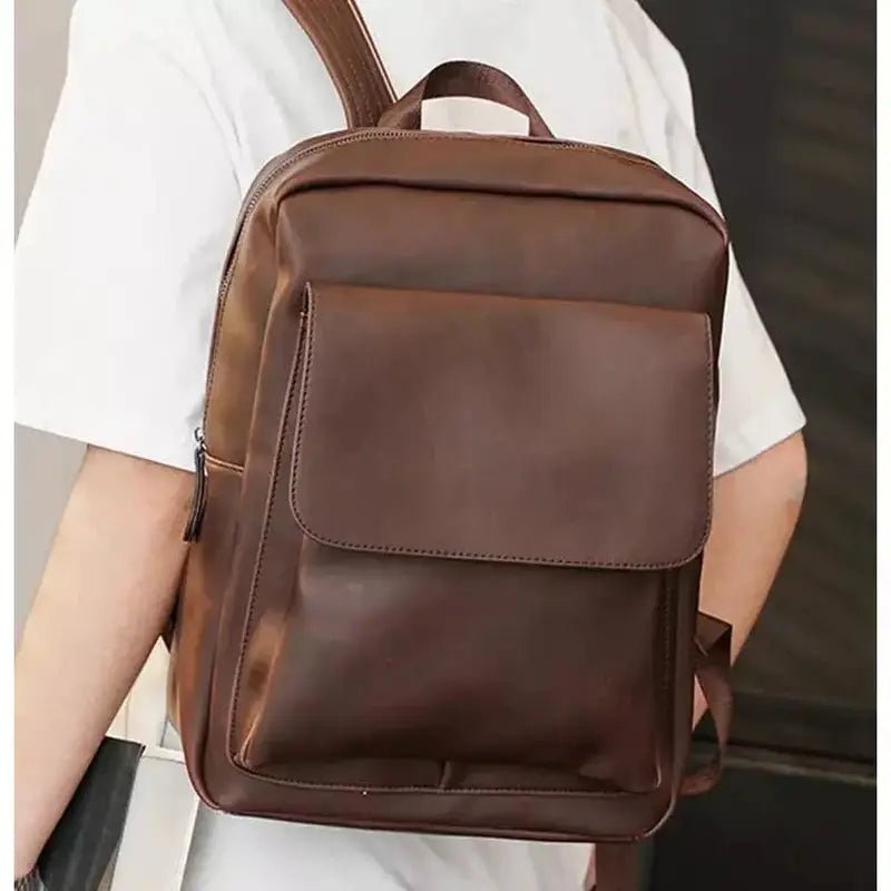 Sac à dos homme cuir vintage en cuir marron foncé avec poche à rabat frontale