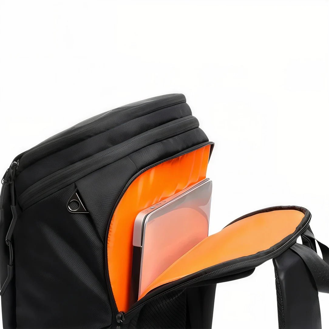 Sac à dos imperméable ordinateur avec intérieur orange et compartiment pour ordinateur portable