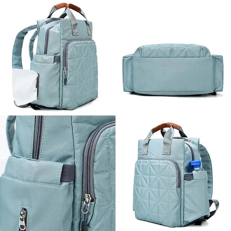 Sac à dos à langer bébé bleu clair en quilting avec multiples compartiments et poignées