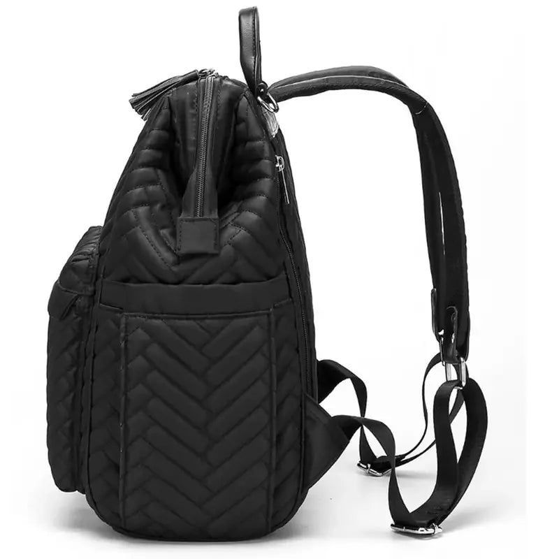 Sac à dos à langer design en cuir noir avec motif chevron matelassé et bretelles