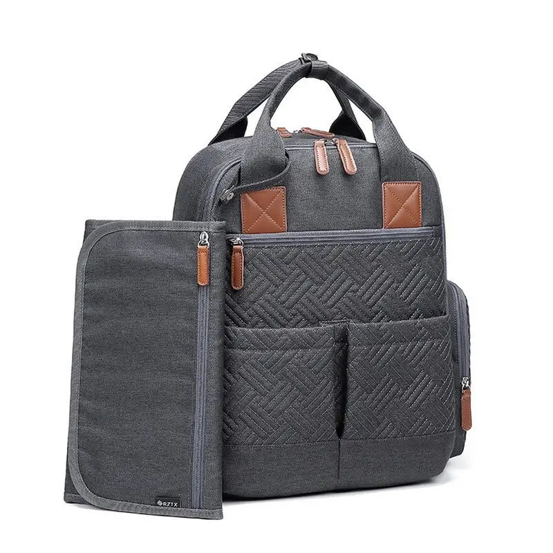 Sac à dos sac à langer gris foncé avec matelas à langer en cuir marron