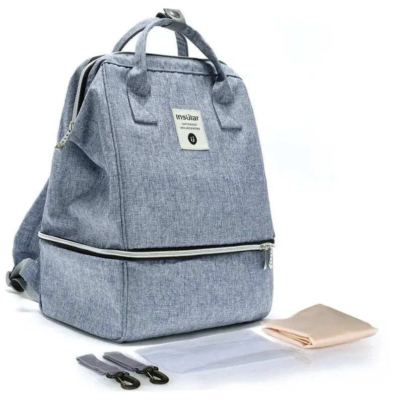 Sac à dos à langer imperméable en toile bleu clair avec compartiment zippé en bas