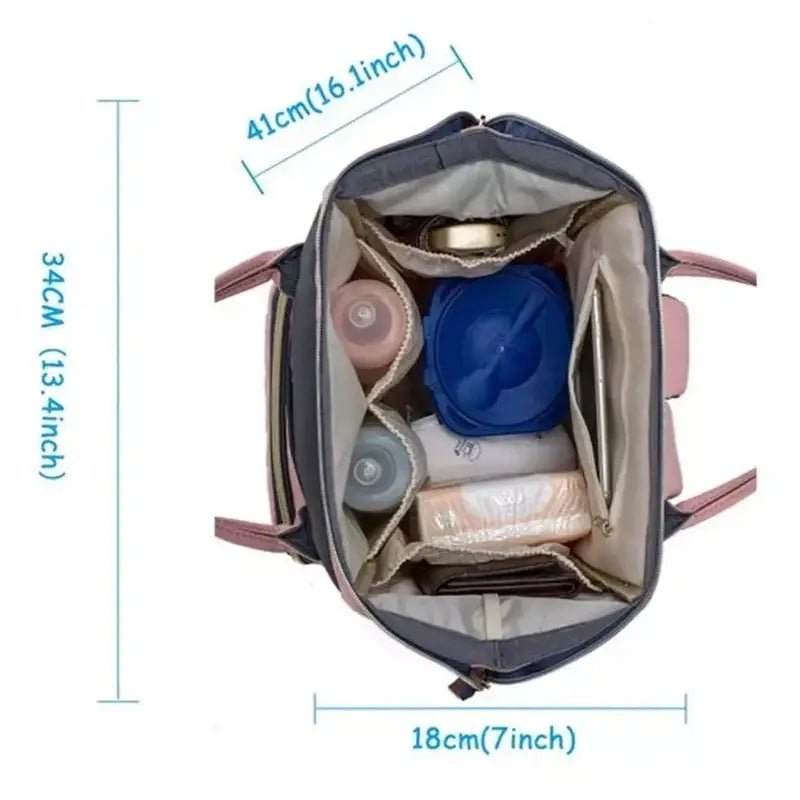 Sac à dos à langer le Queen gris et rose avec compartiments et essentiels pour bébé