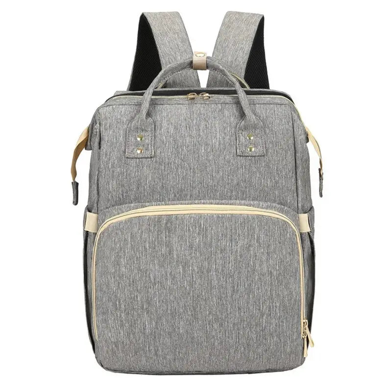 Sac à dos à langer lit gris chiné avec accents tan clair et zips dorés
