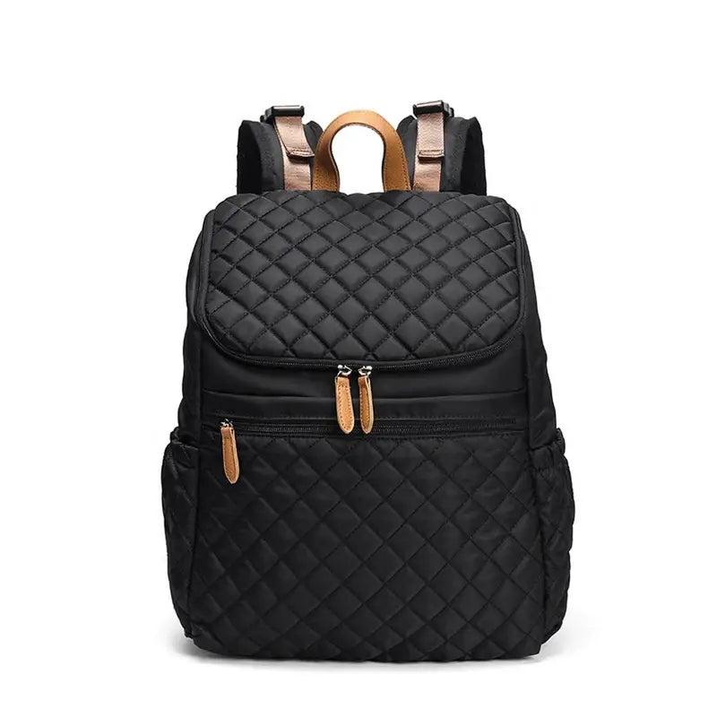 Sac à dos à langer noir en nylon matelassé avec accents tan pour bébé et maman
