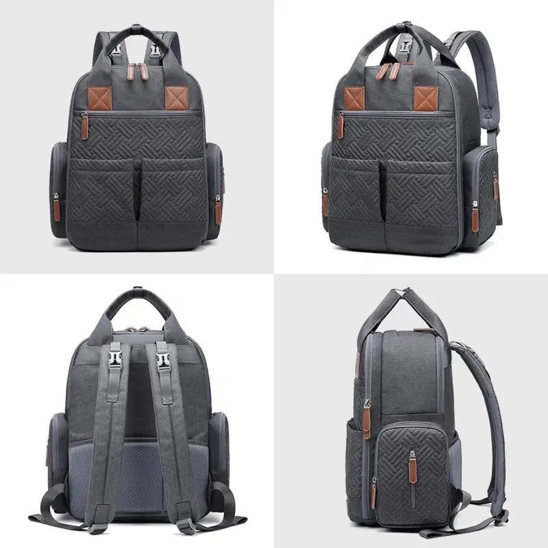 Sac à dos sac à langer gris foncé matelassé avec accents en cuir marron et poches multiple
