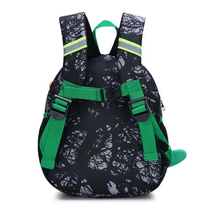 Sac à dos maternelle dinosaure pour enfants avec motif noir et vert, bandes réfléchissantes et harnais de sécurité
