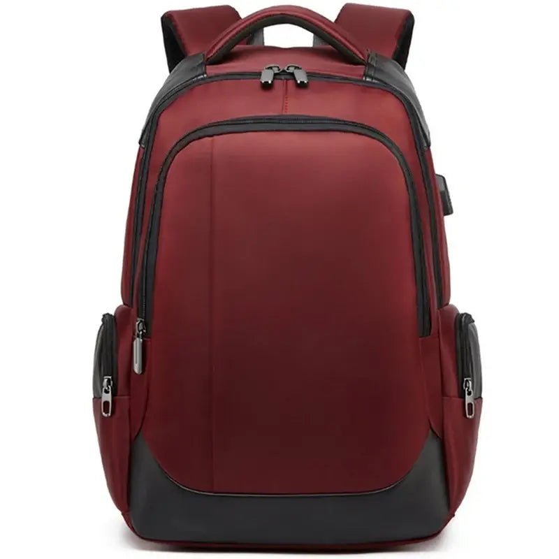 Sac à dos multi compartiments maroon avec accents noirs, plusieurs poches zippées