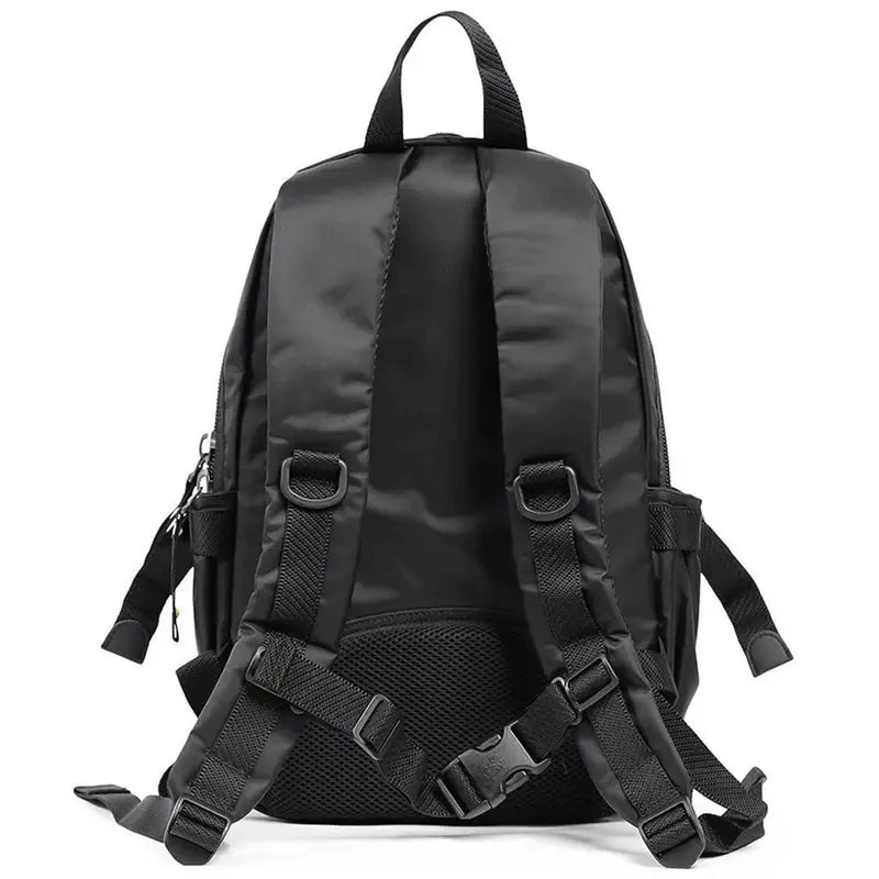 Sac à dos multi rangement en nylon noir avec bretelles ajustables et poignée supérieure