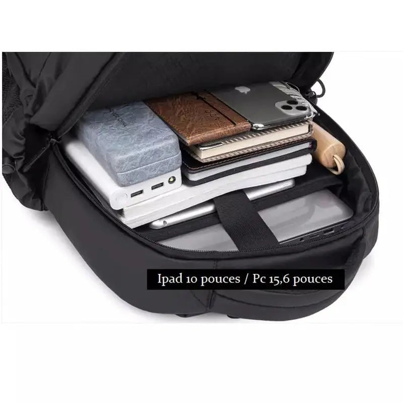 Sac à dos multifonction pour ordinateur noir rempli d appareils électroniques et carnets