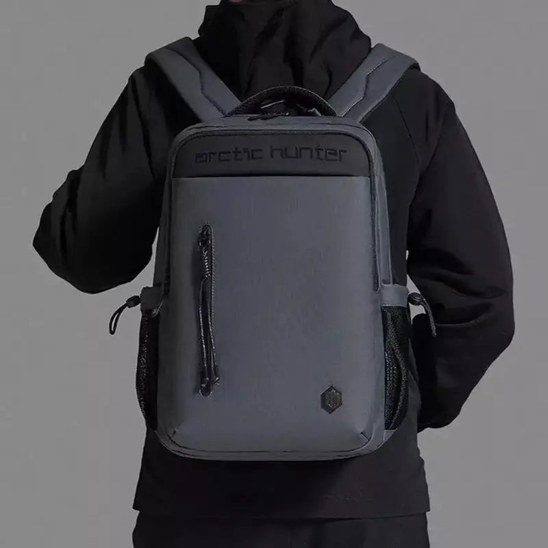 Sac à dos multifonction pour ordinateur gris foncé avec bretelles rembourrées et poches multiples