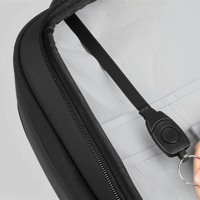 Sac à dos ordinateur 16 pouces City HK ouvert montrant intérieur clair et bandoulière noire avec anneau
