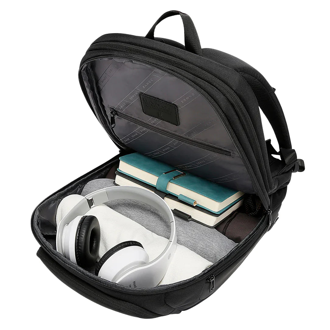 Sac à dos ordinateur 17 pouces Orion avec écouteurs et cahiers visibles à l’intérieur