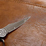 Couteau à lame en argent avec poignée circulaire noir et blanc pour Sac à dos ordinateur homme en cuir
