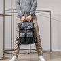 Sac à dos ordinateur imperméable homme en faux cuir noir avec plusieurs poches