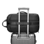 Sac à dos ordinateur professionnel noir attaché à une valise argentée à roulettes