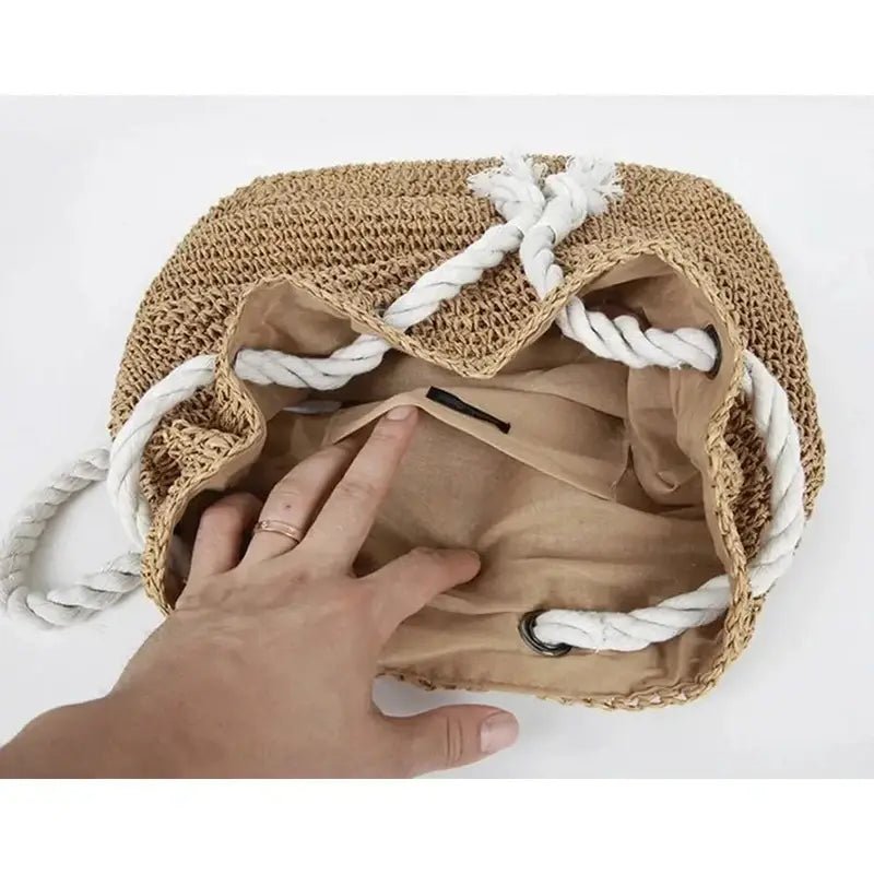 Sac à dos paille en paille tressée avec poignées en corde blanche et doublure en tissu tan