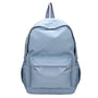 Sac à dos petite fille en nylon bleu clair avec poche frontale et poches latérales