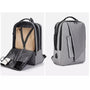Sac à dos pour pc portable gris rectangulaire avec plusieurs compartiments et poche pour tablette