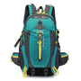 Sac à dos randonnée 30L teal et gris avec accents jaunes et plusieurs compartiments