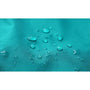 Tissu teal résistant à l’eau avec perles d’eau visibles sur le Sac à dos randonnée étanche