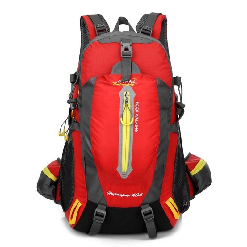 Sac à dos randonnée femme 40l rouge et gris avec accents jaunes et multiples compartiments