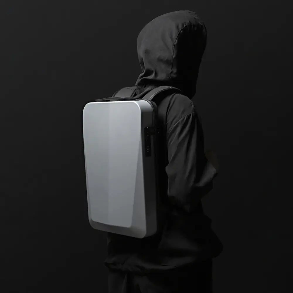 Sac à dos rigide ultra-plat antivol Atom avec devant gris clair et côtés gris foncé