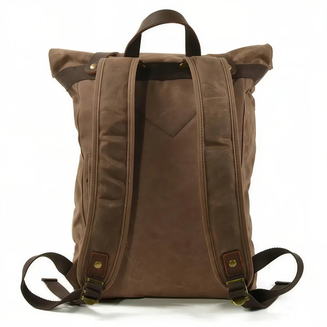 Sac à dos rétro en toile marron avec accents en cuir et bretelles ajustables