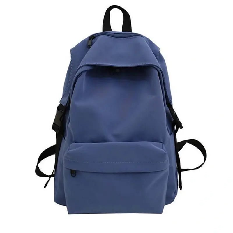 Sac à dos scolaire en tissu bleu solide avec bretelles et boucles noires