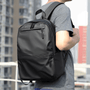 Sac à dos scolaire casual noir imperméable et résistant avec plusieurs compartiments zippés