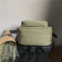 Sac à dos scolaire vert clair avec glacière souple rectangulaire, poignée et bandoulière