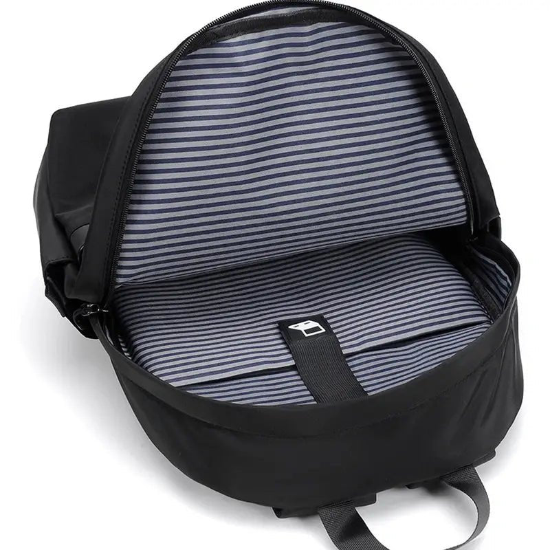 Sac à dos scolaire collège noir avec intérieur rayé et compartiment pour ordinateur portable