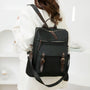 Sac à dos Sirocco en toile noire avec accents cuir marron
