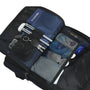 Sac à dos ultra plat extensible NeoFlat X ouvert avec compartiments et objets personnels