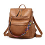 Sac à dos vintage femme en similicuir tan avec sangle tissée colorée et fermetures éclair multiples