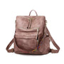 Sac à dos vintage femme en similicuir rose poudré avec sangles tissées